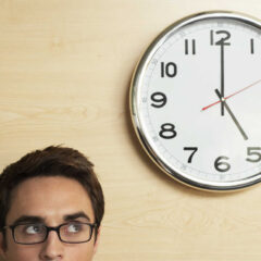 Manlooksatclock180324